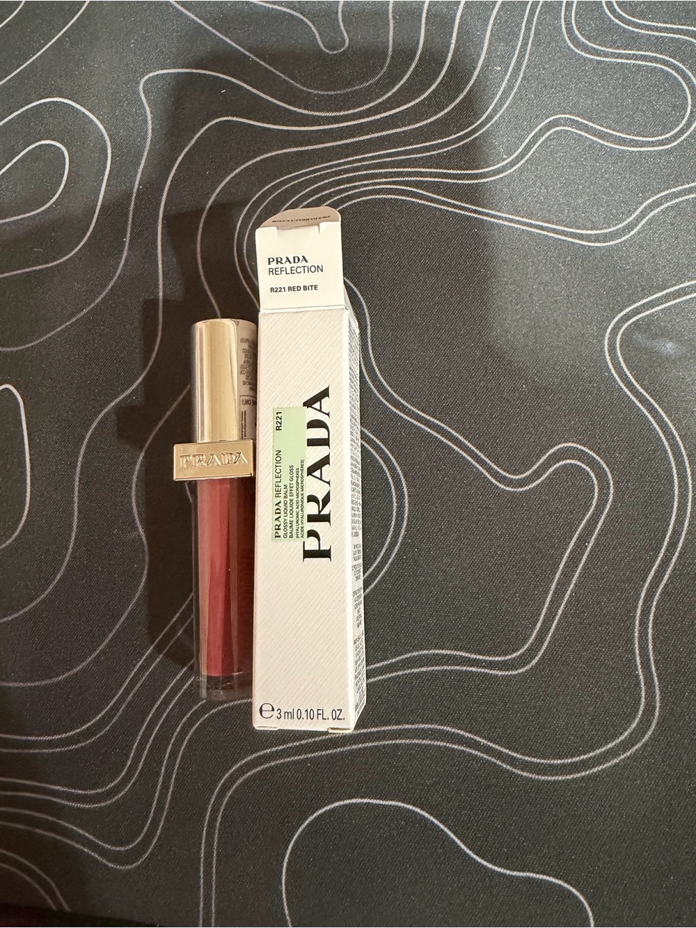 Prada Reflection Lip Color R221 Red Bite - Prada Red Lip Tint
